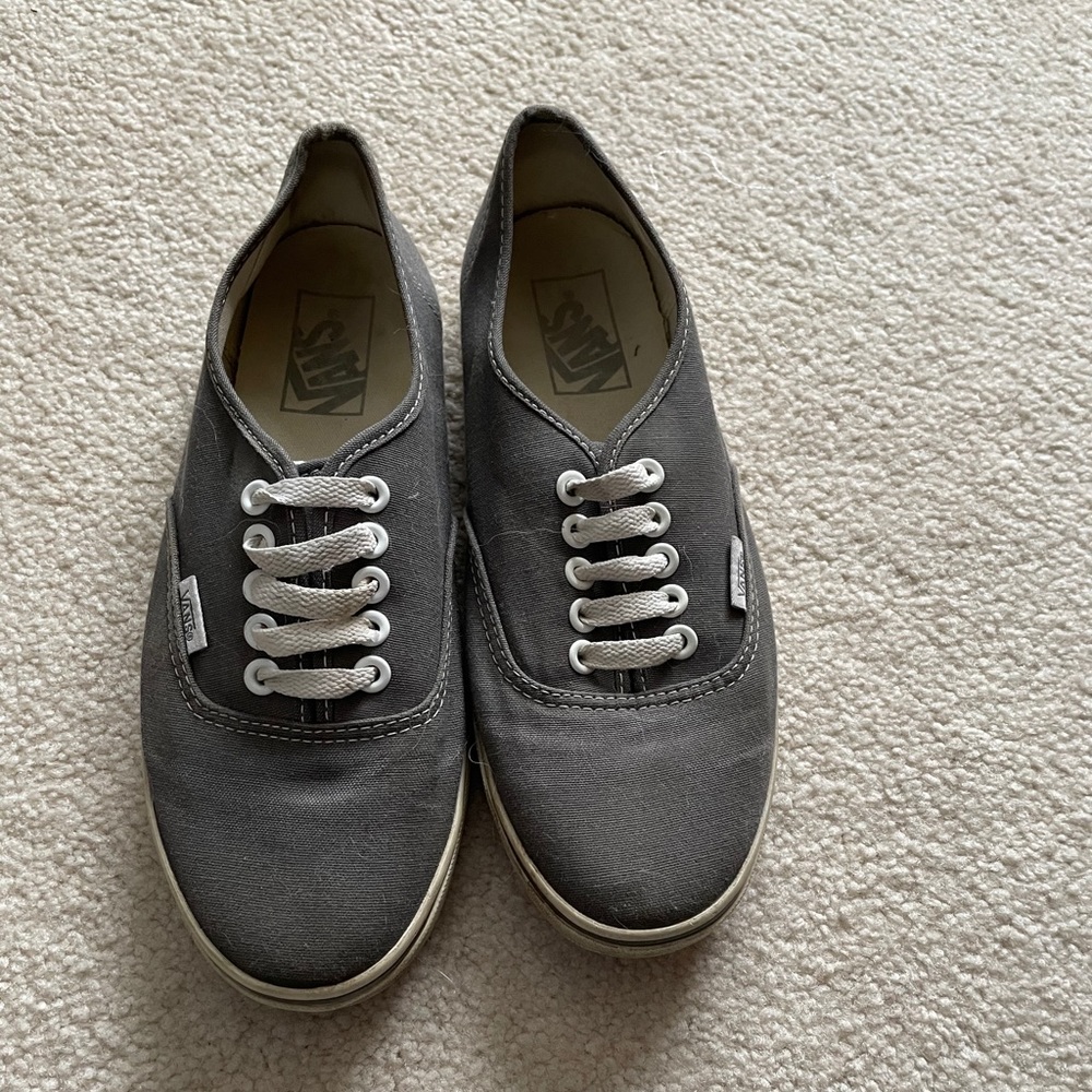 Grey Vans.